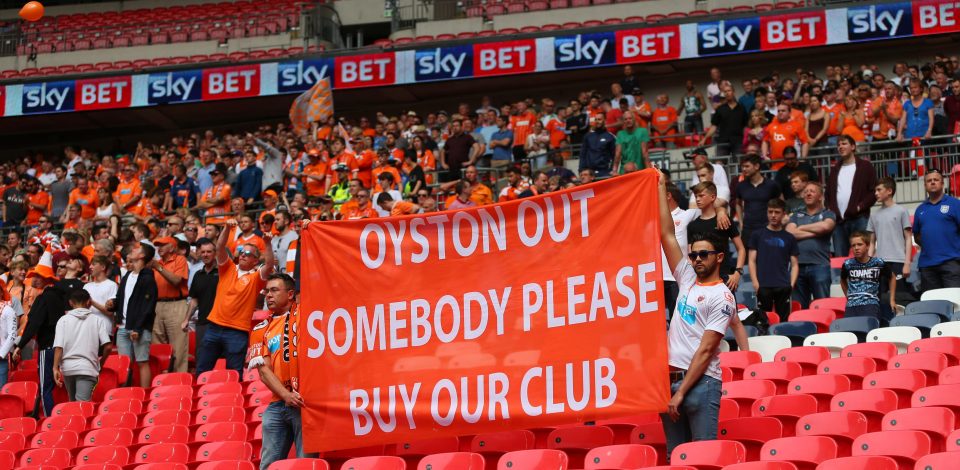  Blackpol fans protest at their League Two play-off final with Exeter back in May