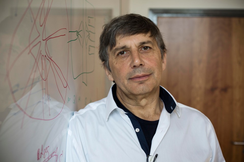 Soviet-born Dutch-British physicist Professor Sir Andre Geim pictured at his office at the University of Manchester