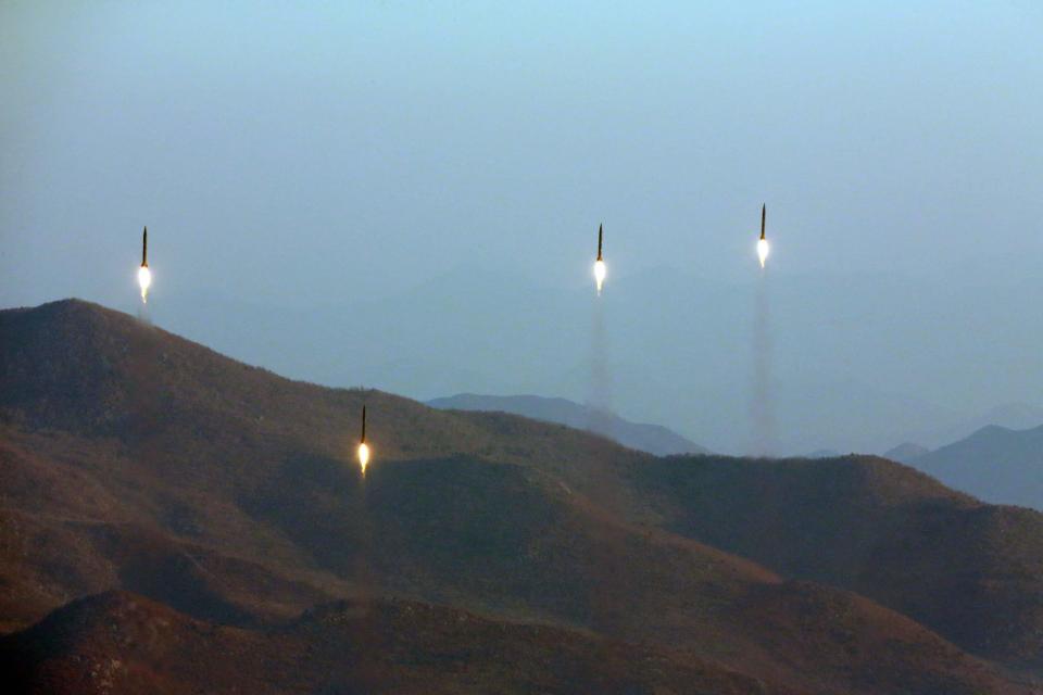  Four projectiles during a ballistic rocket launching drill of Hwasong artillery units of the Strategic Force of the Korean People's Army (KPA) at an undisclosed location in North Korea