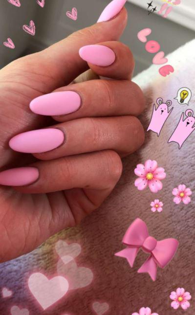  This pink manicure shot could have been a hint about the sex of her baby