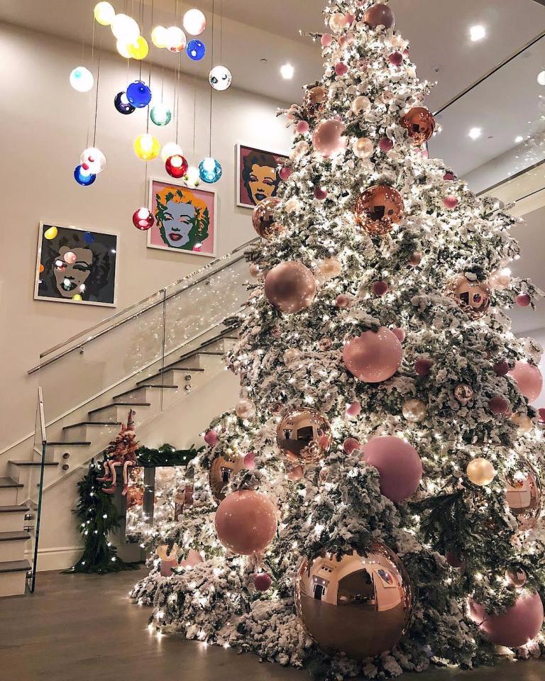  Kylie appears to have hinted she's having a baby girl with the colour of her impressive Christmas tree