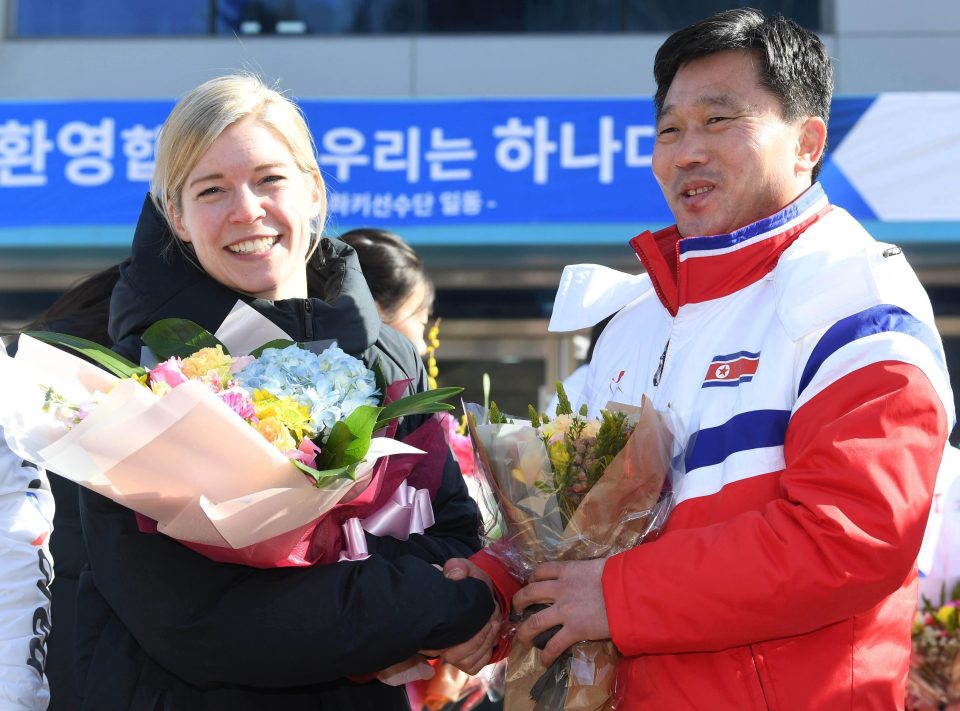  Sarah Murray, coach of the two Korea's unified women's ice hockey team, and Pak Chol-ho, coach of the North Korean women's team