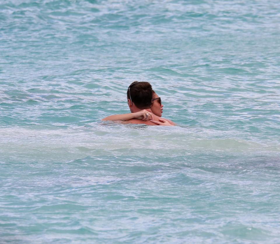  The pair hugged as they went for a dip in the sea