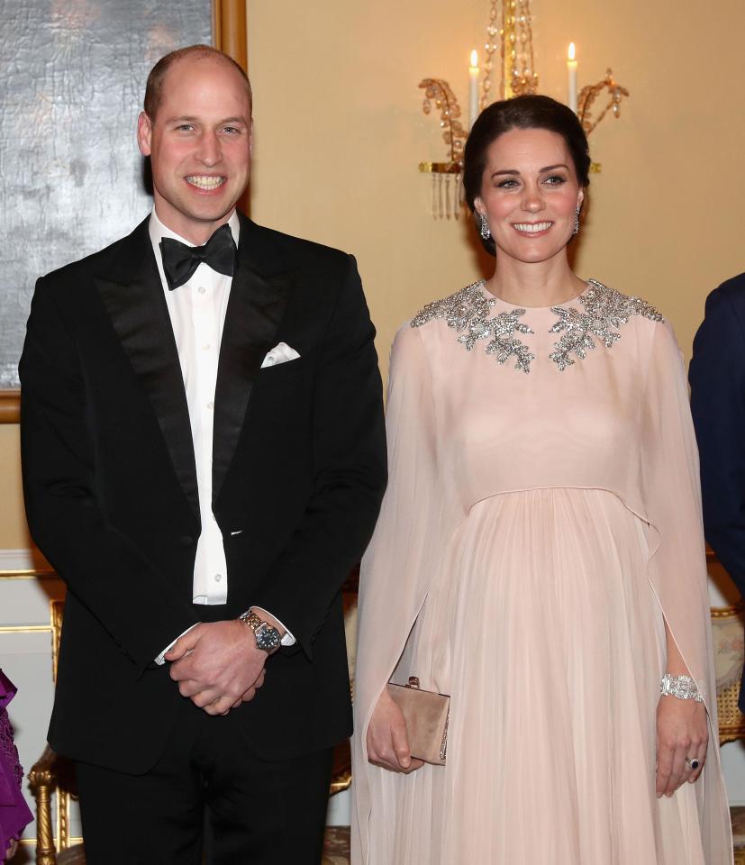  Kate wore a pale gown with a silver embellishment on her shoulders