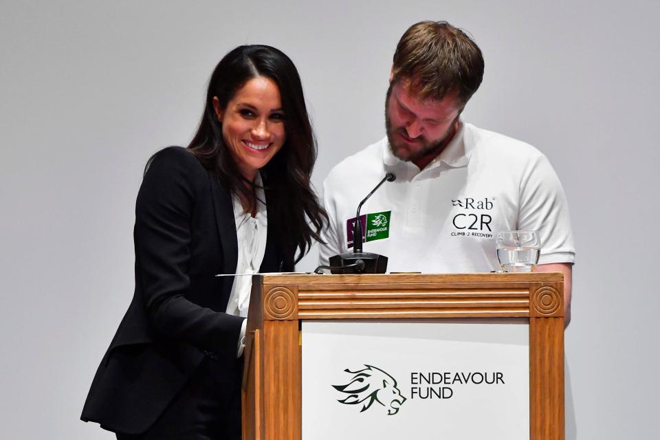  Meghan looked relaxed in the spotlight as she gave out an award this evening