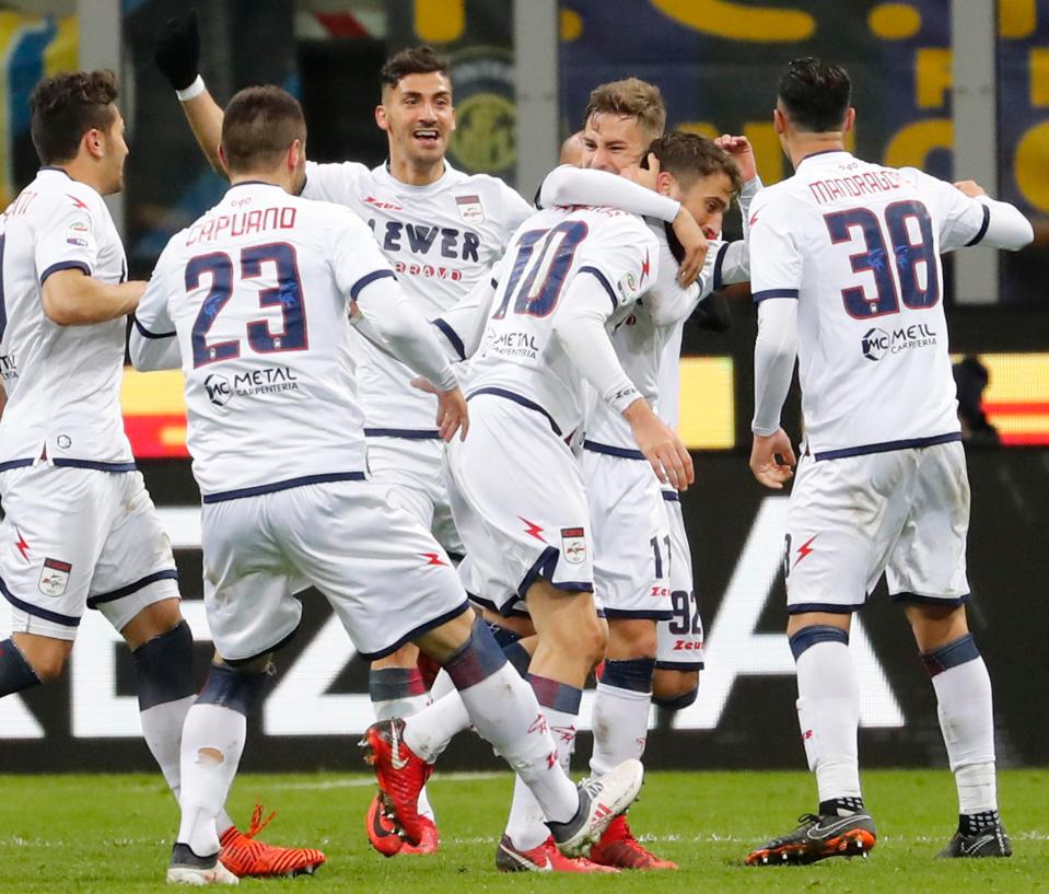  Crotone celebrate their valuable equaliser in their battle against relegation