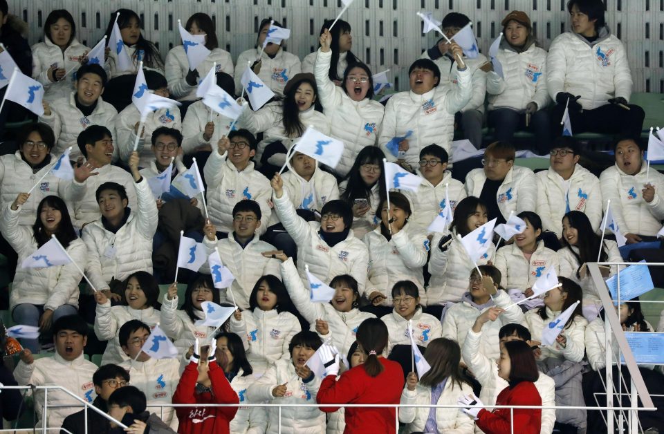  Korea ice hockey fans cheer on their unified women's team