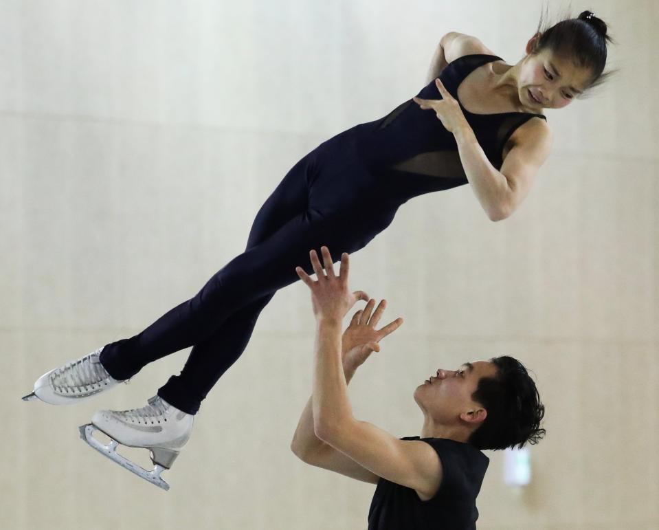  North Korea's Ryom Tae Ok (left) and Kim Ju Sik are known on the international circuit