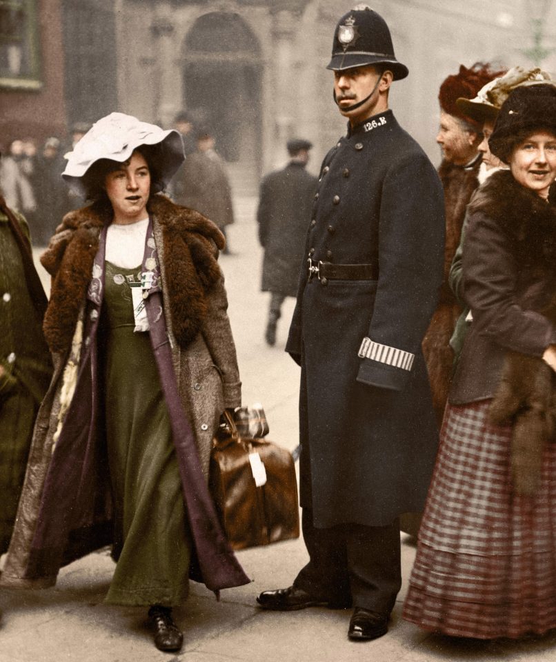  Mabel Capper wears the Suffragettes colours of purple and green after appearing in court in 1912