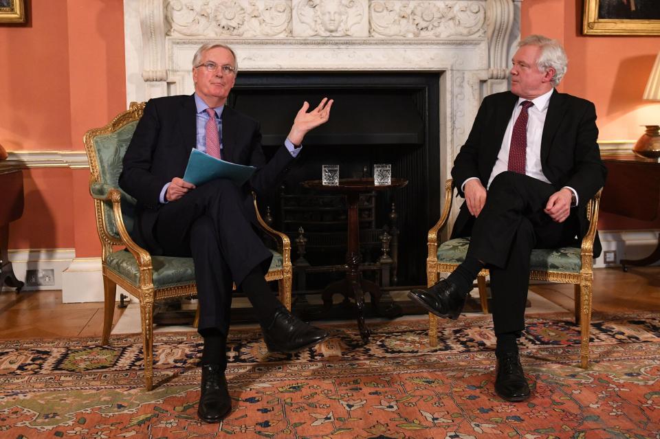  Mr Barnier, left, urged for 'clarity' from Theresa May on Brexit