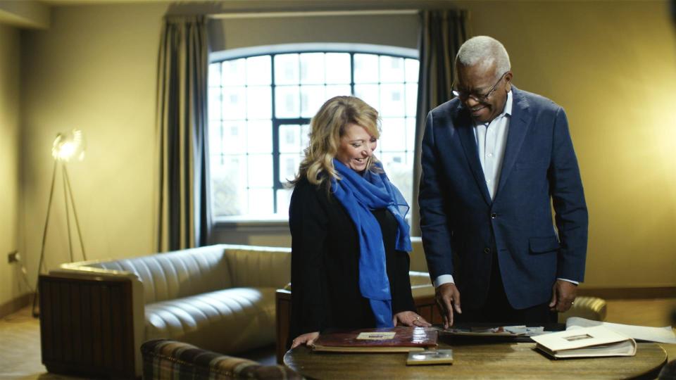 The proud mum shows Sir Trevor her treasured old photos of James 