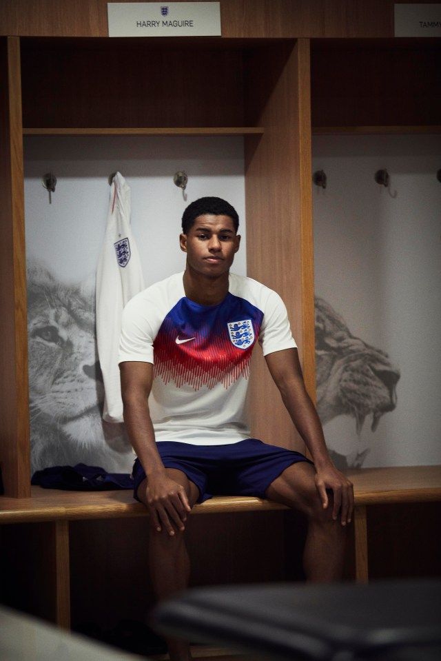 Marcus Rashford poses in the new England training kit