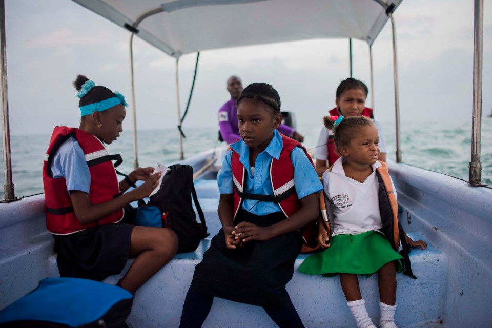 Kids from one island travel to school on another in the morning by boat 