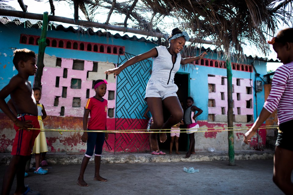 A group of girls playing Jimmy, a traditional game based on jumping the rope 