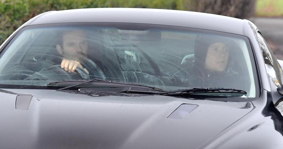  Ander Herrera covered up as he was driven in by pal Juan Mata after match fixing allegations against him