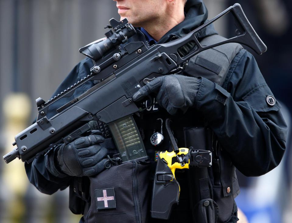  Police officer pictured carrying a Heckler and Koch G36 5.56 Caliber Assault Rifle, Taser and handgun