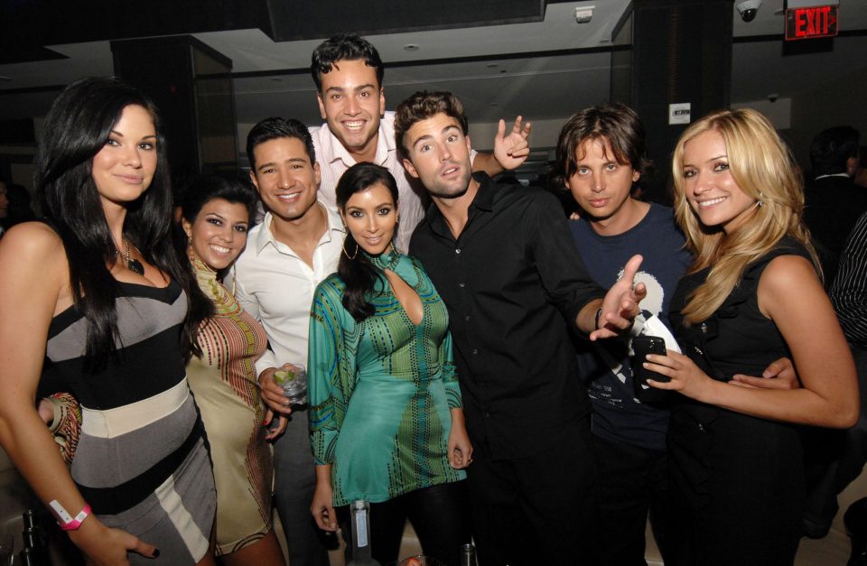  Kim and Kourtney Kardashian and Brody Jenner (3rd from right) hanging out in 2008, alongside Jayde Nicole, Mario Lopez, Jonathan Cheban, and Kristin Cavallari