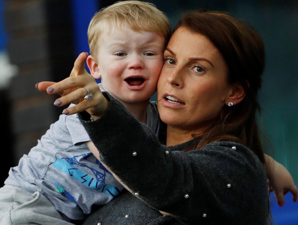  Kit Rooney watched dad Wayne in the arms of the Everton maestro's wife