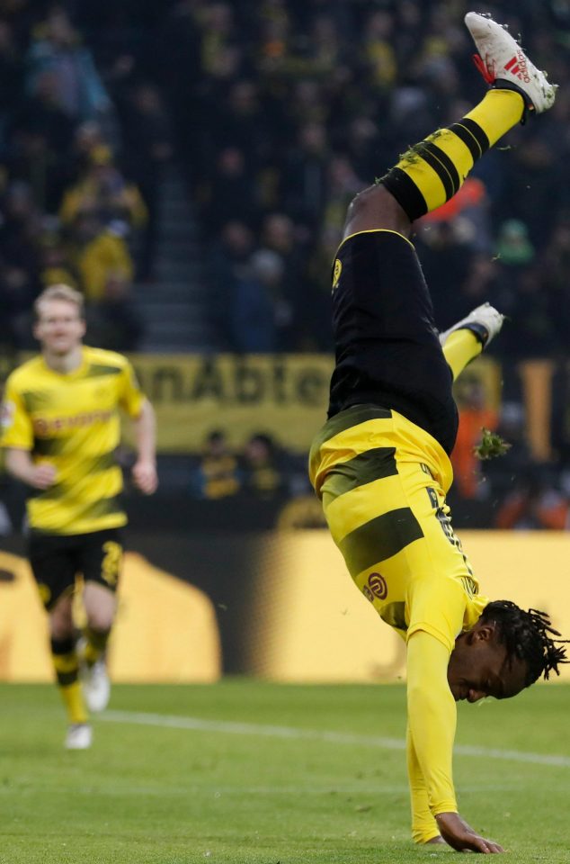  Batshuayi begins his acrobatic goal celebration