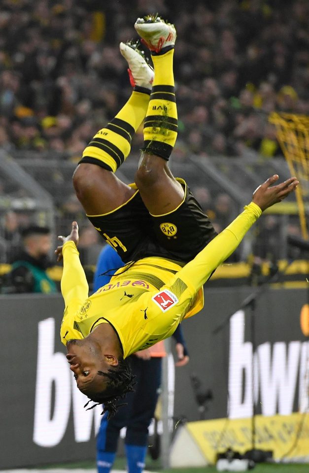  Michy Batshuayi goes head over heels after scoring for Borussia Dortmund against Hamburg