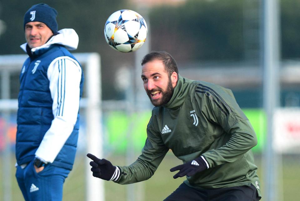  Juventus' £75million striker Gonzalo Higuain gives Spurs ace Harry Kane a run for his money