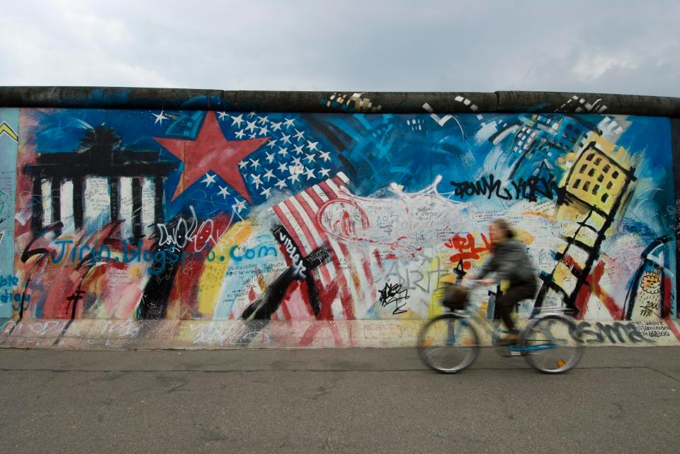  Parts of the Berlin Wall still stand... and are heavily daubed in graffiti