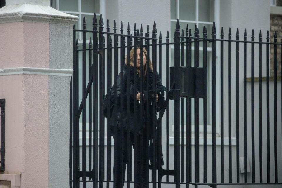  Melanie, 42, left the city pad alone, maintaining a straight face as she exited the home's iron gate shut