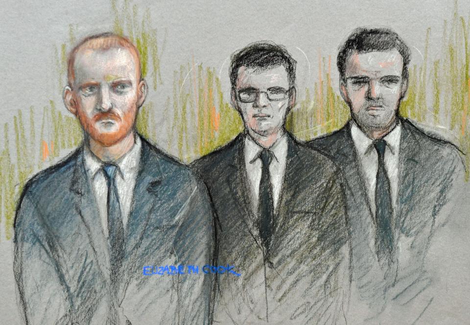  The trio stood emotionless in court today