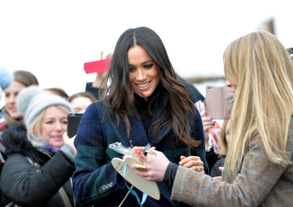  Meghan Markle looked stylish in a tartan coat