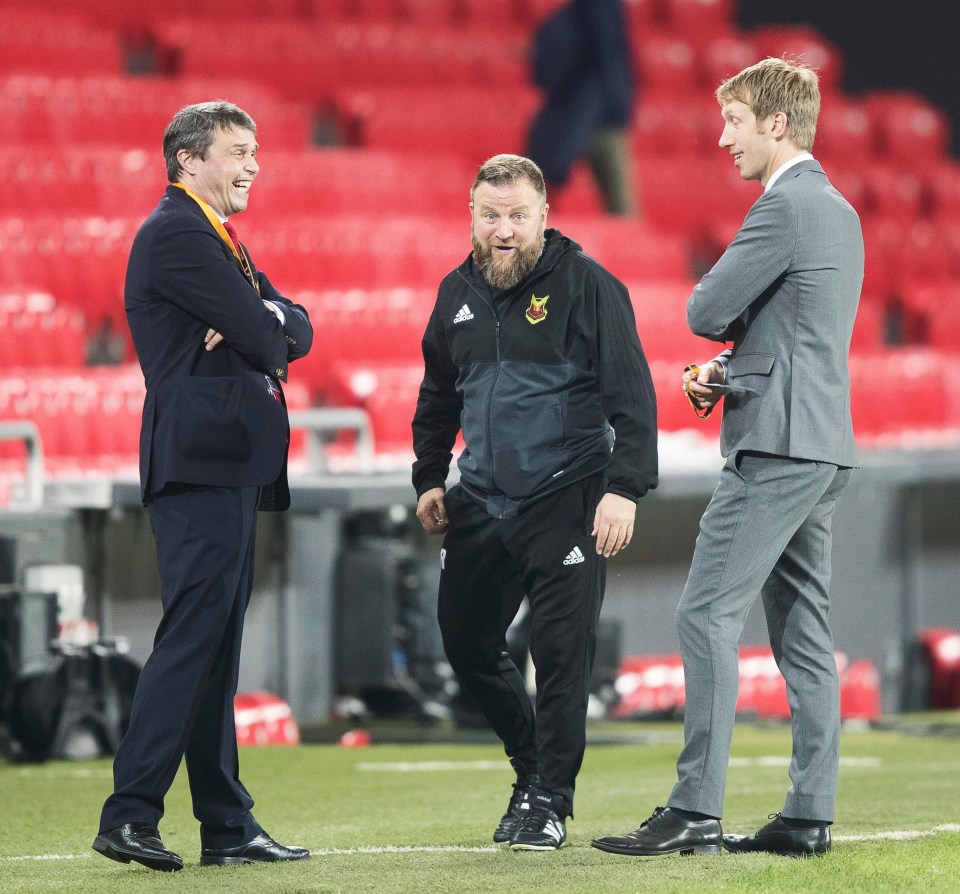 Daniel Kindberg laughs with assistant boss Billy Reid and manager Graham Potter