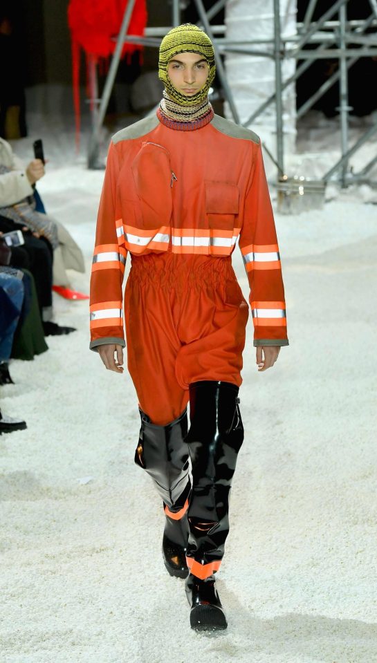  A male model turned heads in heavy-soled leather boots and a green woolly balaclava