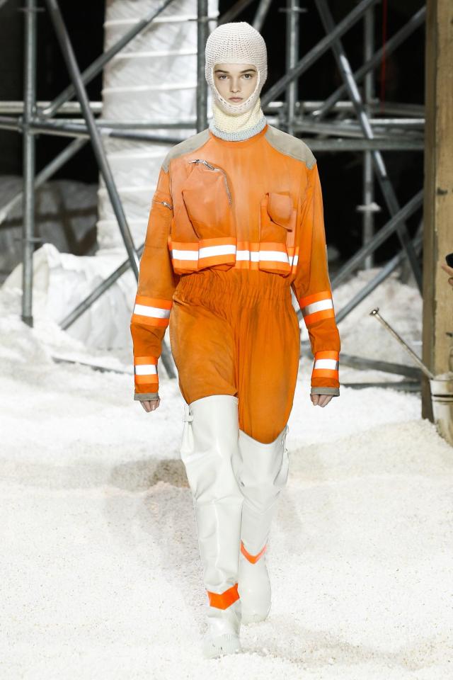  Models stormed down the Calvin Klein NYFW runway yesterday in high-vis orange coats and balaclavas