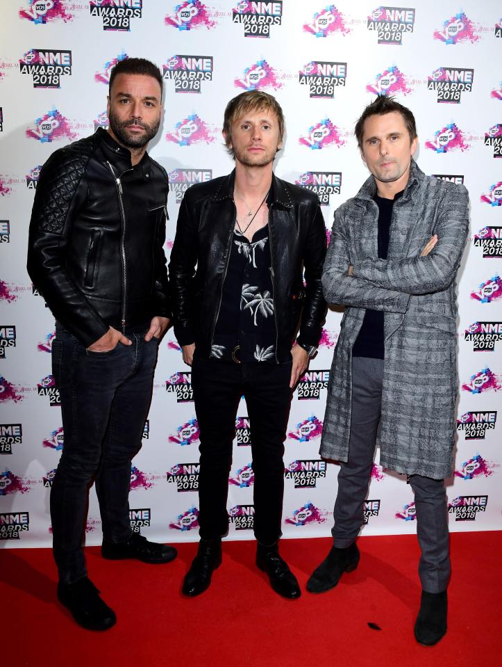  Muse rocked the red carpet with matching glum expressions