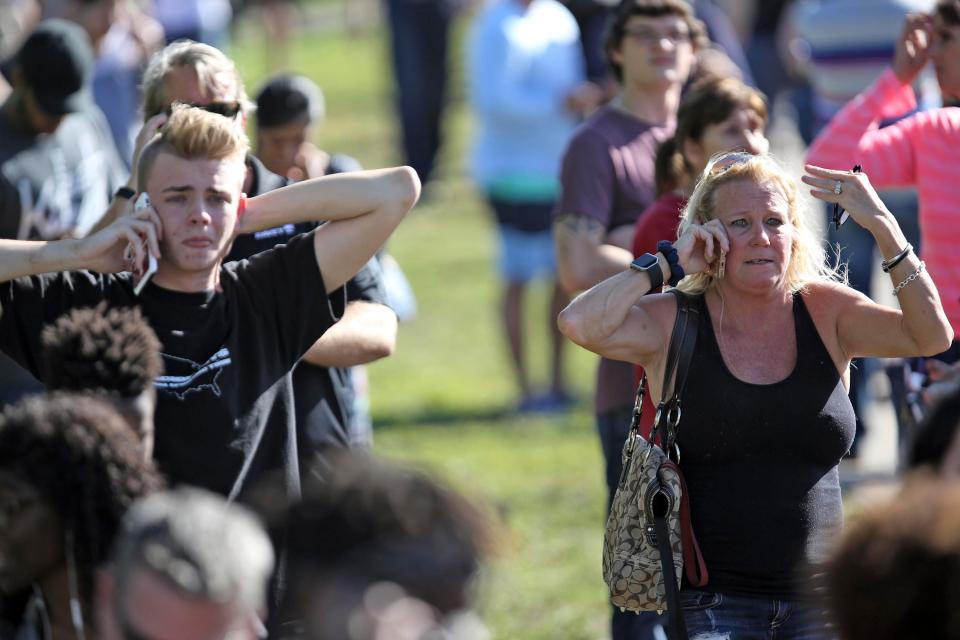  Anguished relatives desperately wait to hear whether their loved ones are safe