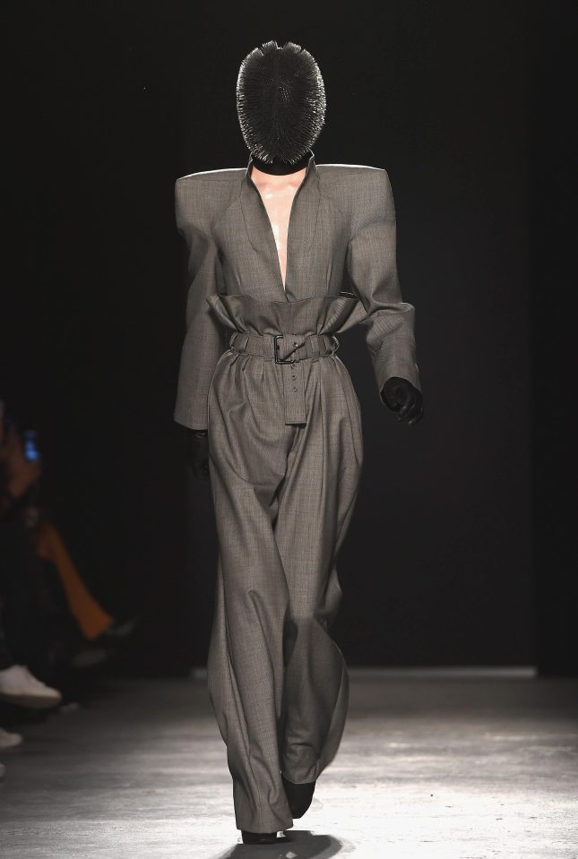  A model wears a bizarre mask at the Gareth Pugh show