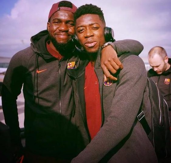  Samuel Umtiti and Ousmane Dembele face the camera