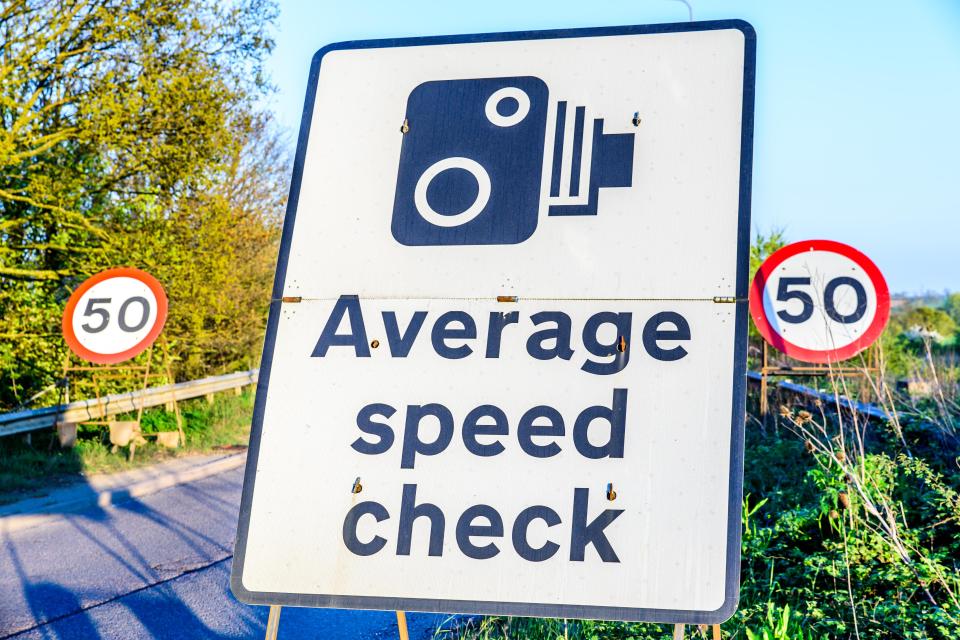  The average speed check sign in place on a road