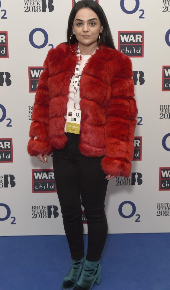  BRITs nominee Hayley Squires looked chic in a red furry jacket at the show