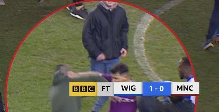  Aguero lashed out at the pitch invader after Manchester City lost to Wigan