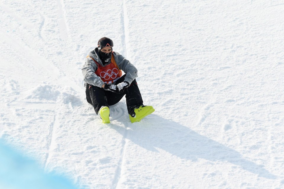 Gisler looks dazed after hitting the snow from a fall of around 10 metres