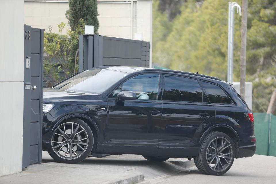  Philippe Coutinho arrives back at home as Spanish forensic police search the scene of the crime