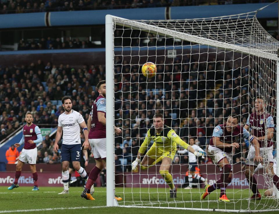  Sam Johnstone watches the ball sail towards the top corner of Villa's net