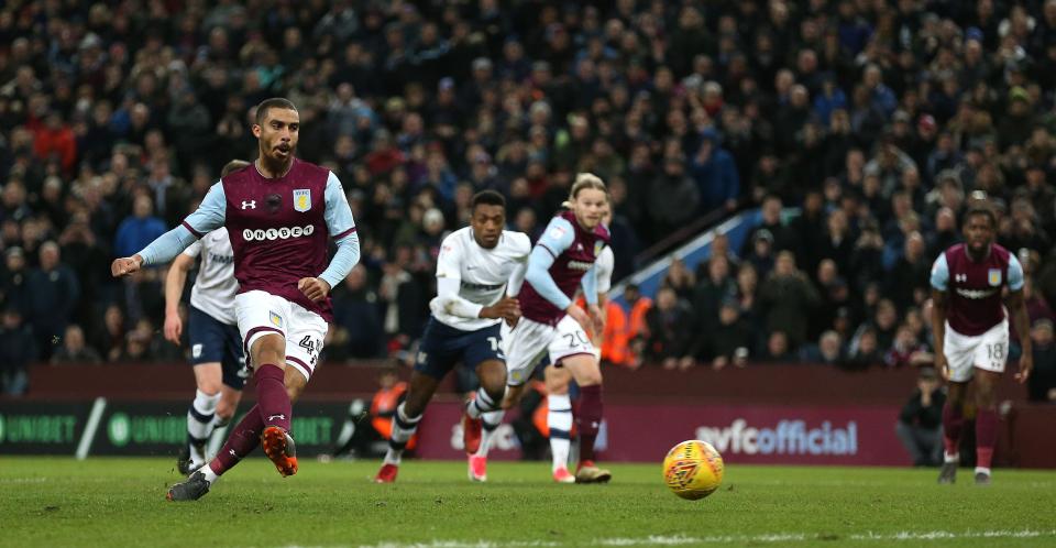  Lewis Grabban salvaged a point for Aston Villa from the penalty spot