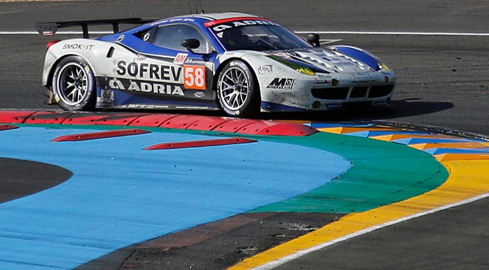  Fabien Barthez whizzes around the Le Mans track in a Ferrari 458 Italia in 2014