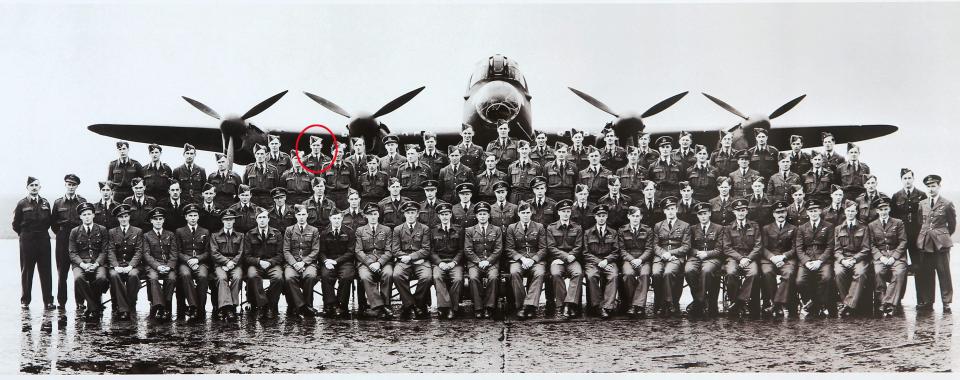  Johnny, circled, with the fellow Dambusters and a Lancaster bomber