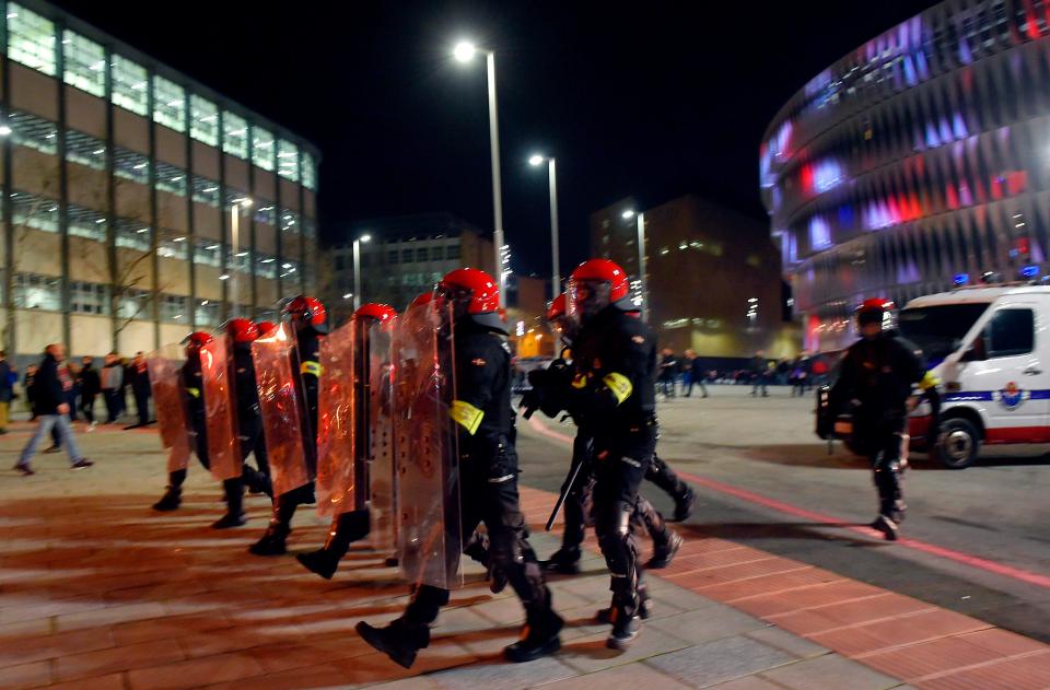  The police were marching with shields