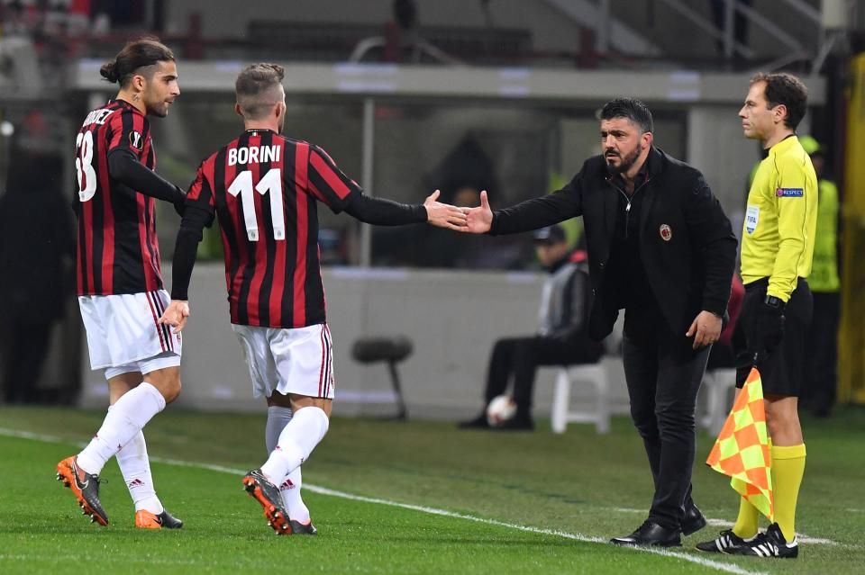  Fabio Borini celebrates with Gennaro Gattuso as AC Milan complete job