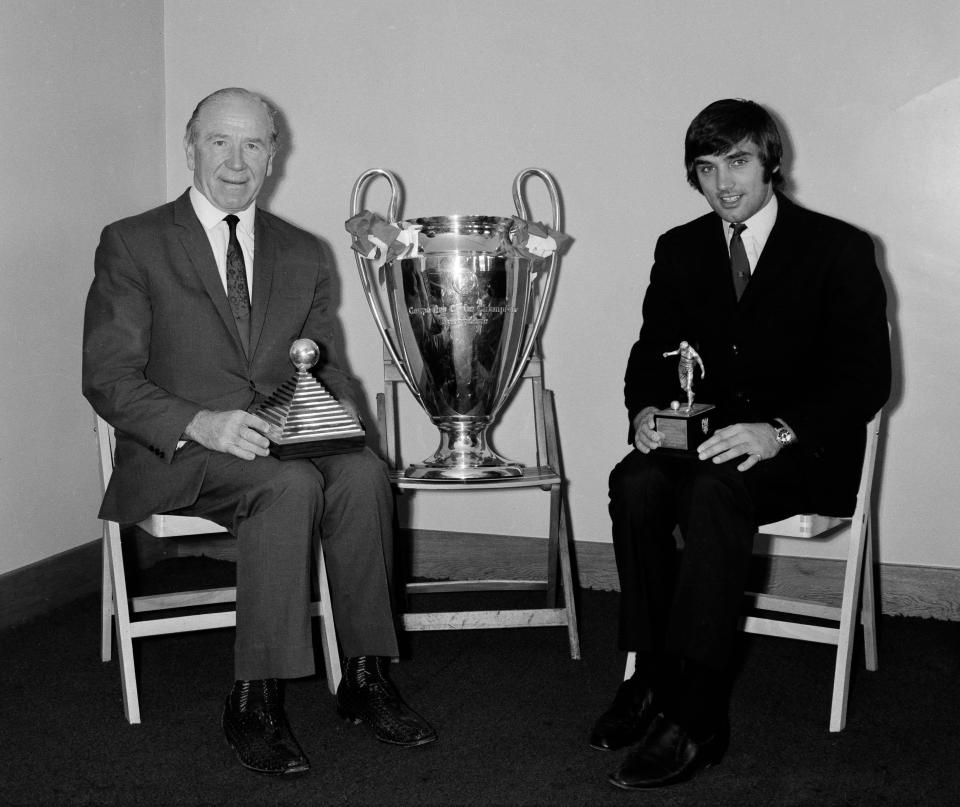  The winger proudly sits next to the European trophy with Matt Busby