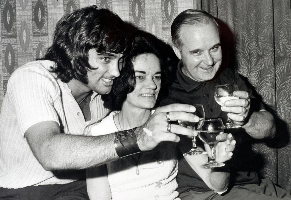  George Best pictured with his mother Ann and father Dick