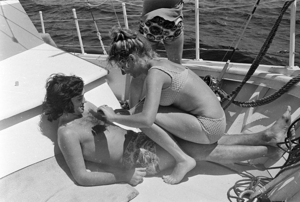  George Best enjoys life at sea with a girlfriend in 1972